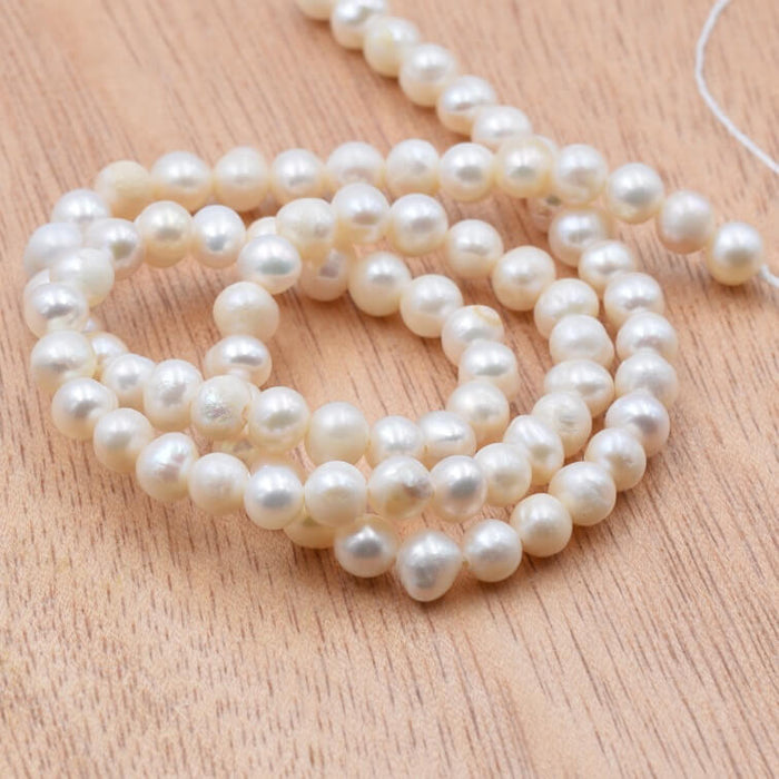 Freshwater pearl potato white beige 5-5.5mm (1strand-35cm)