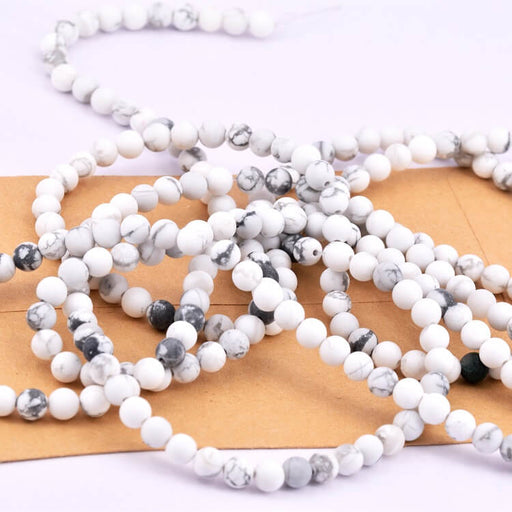 Buy white Howlite Matte round bead 4mm - Hole: 0.8mm (1Strand-36cm)