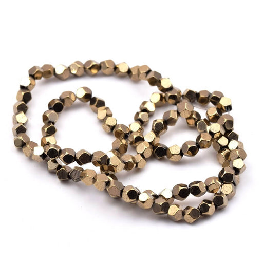 Buy Polygon beads light gold-plated synthetic hematite 4mm (1 Fil-38cm)